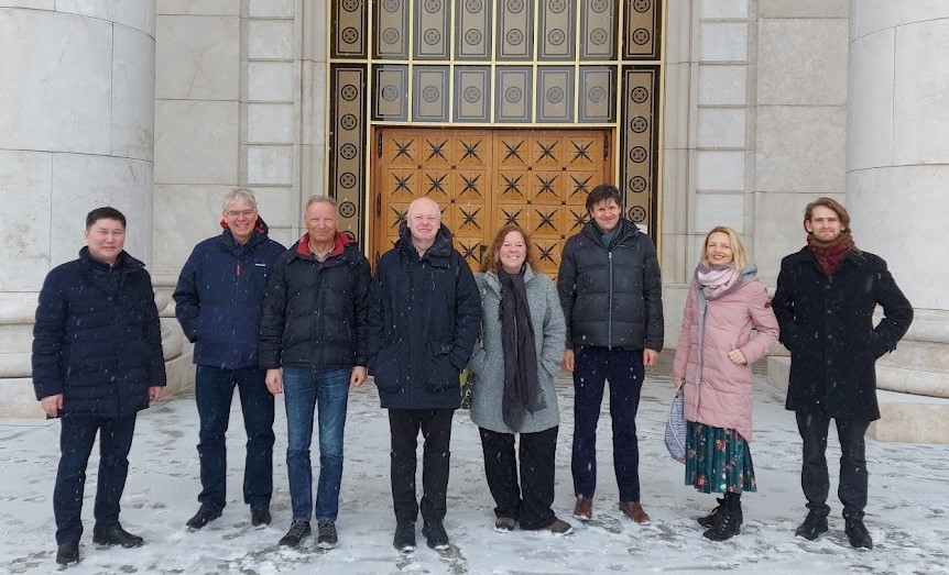 Assessment team in front of the Astana Opera in Kazakhstan